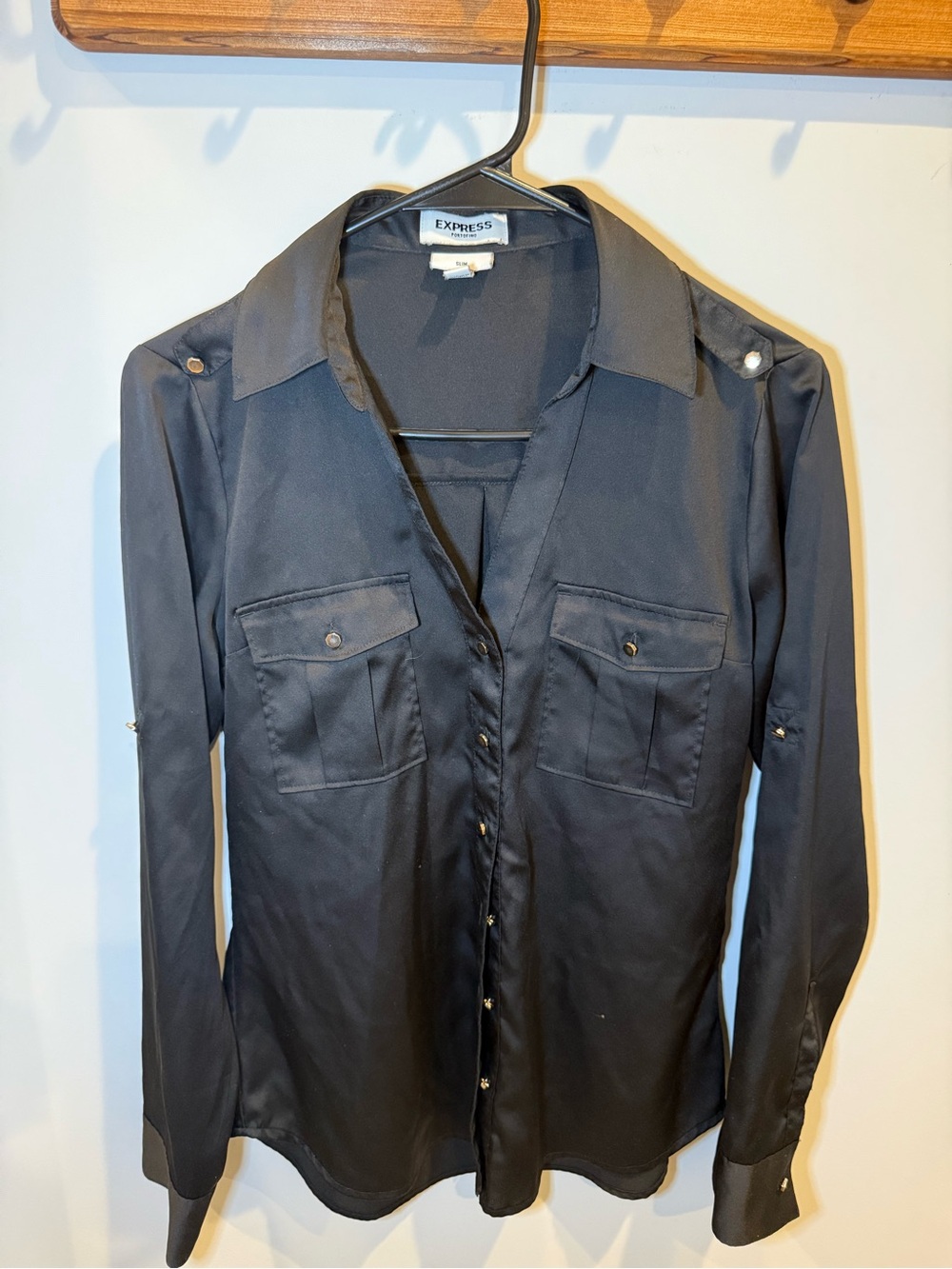 Express Black Long-Sleeve Button-Up Shirt with Chest Pockets and gold accents